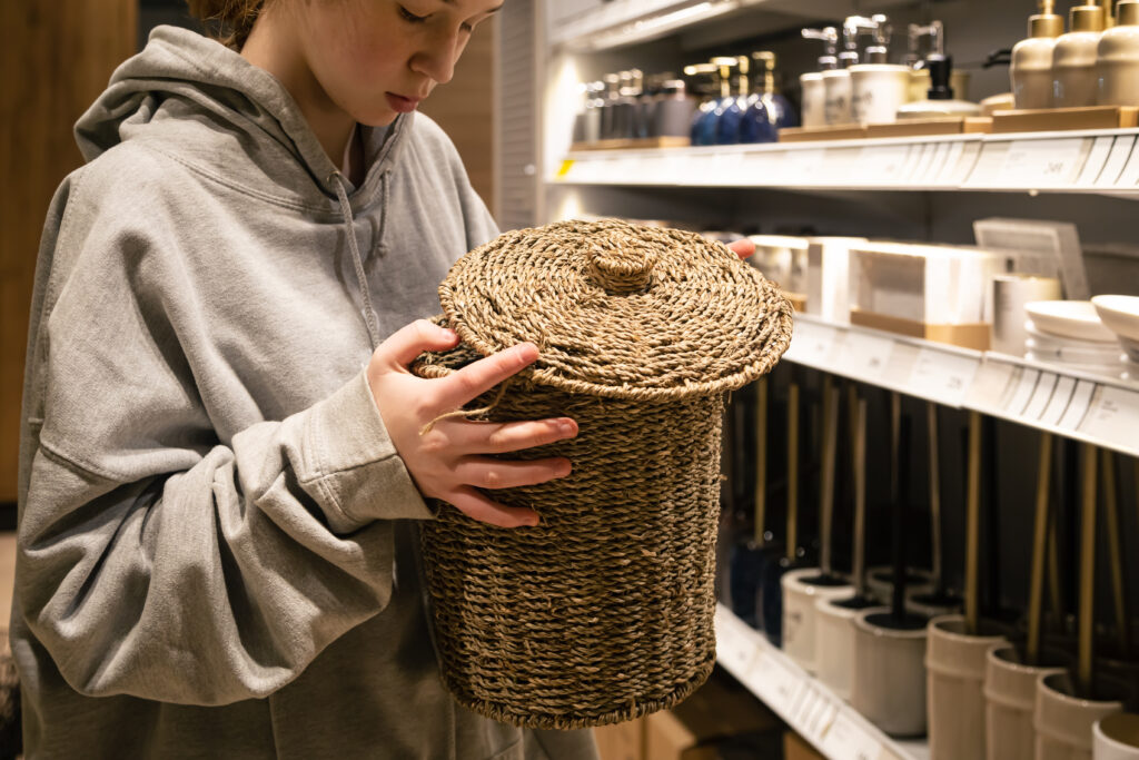 Young Woman Chooses Baskets Home Interior Home Improvement Store