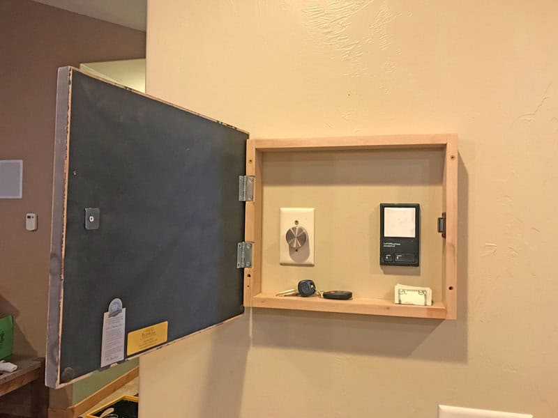 Behind A Wall Mounted Picture Frame