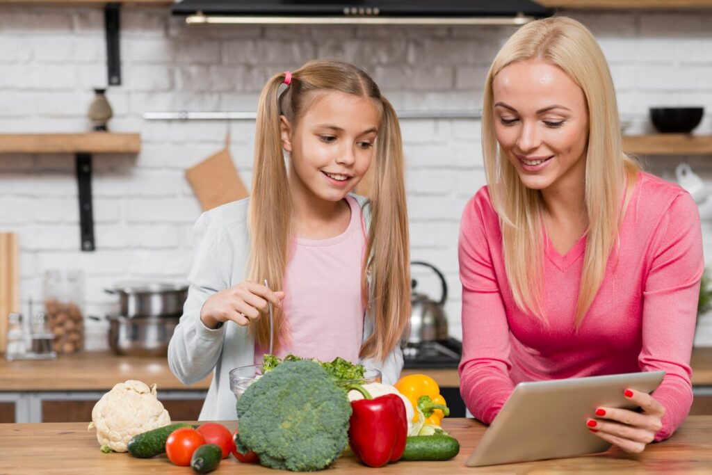 Mother Daughter Looking Digital Tablet 23 2148384755