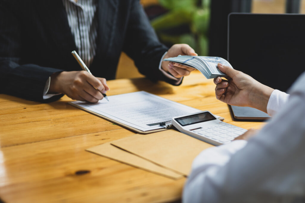Paying Or Bribing The Signing Of An Contract Agreement. Illegal Crime And Dishonesty Concepts.