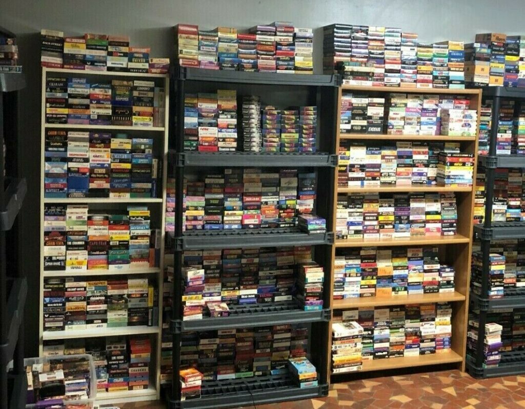 A Towering Stack Of Vhs Tapes