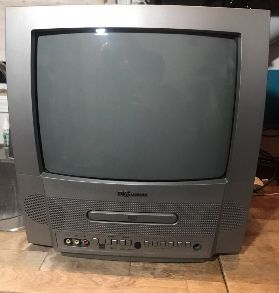 Boxy Tv With A Built In Vcr Or Dvd Player