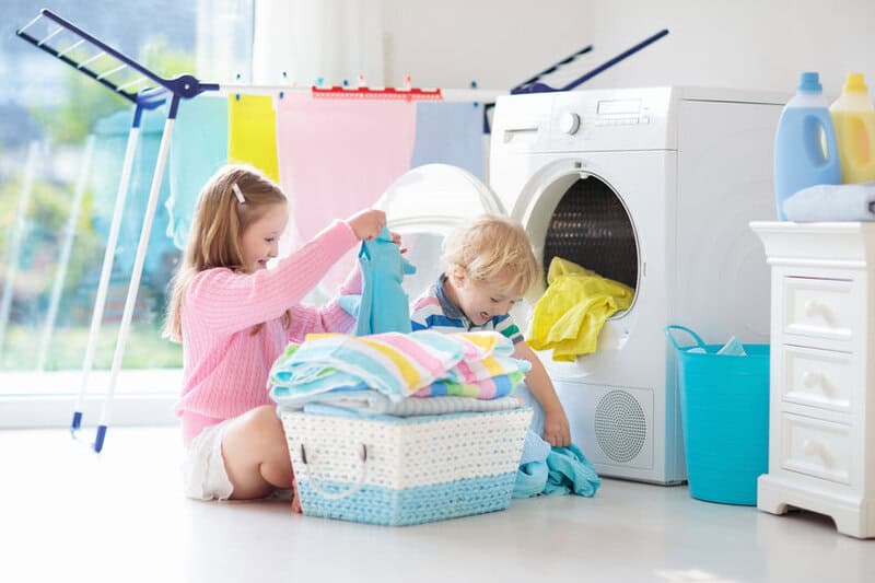 Kids In Laundry Room With Washing Machine