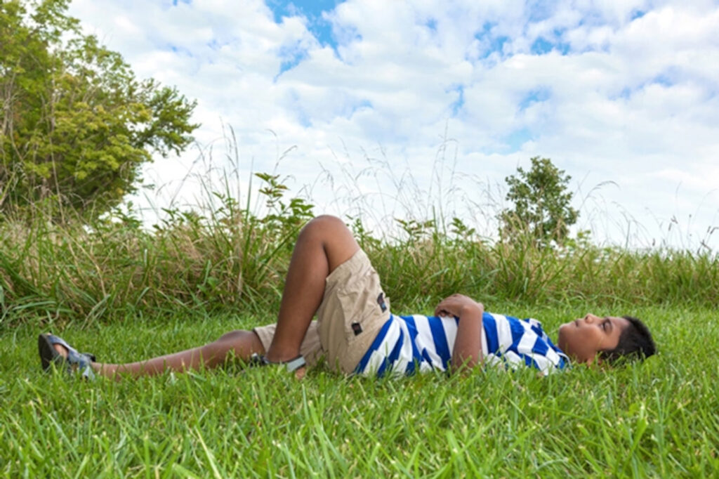 Lying In The Grass And Watching The Clouds