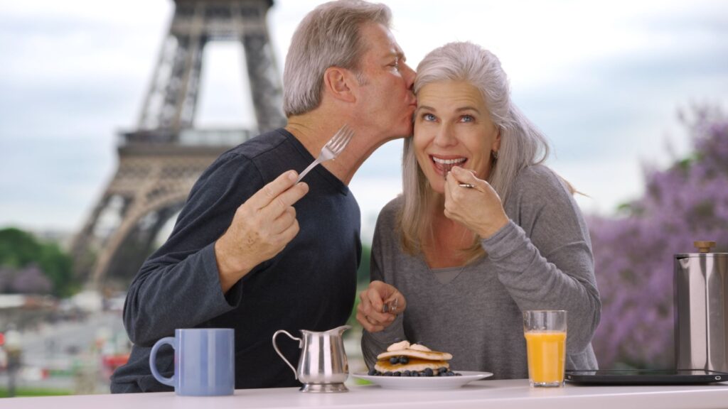 Mature Couple Breakfast In Paris France