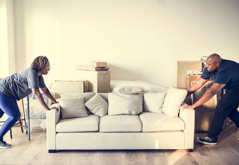 Couple Moving Into New House