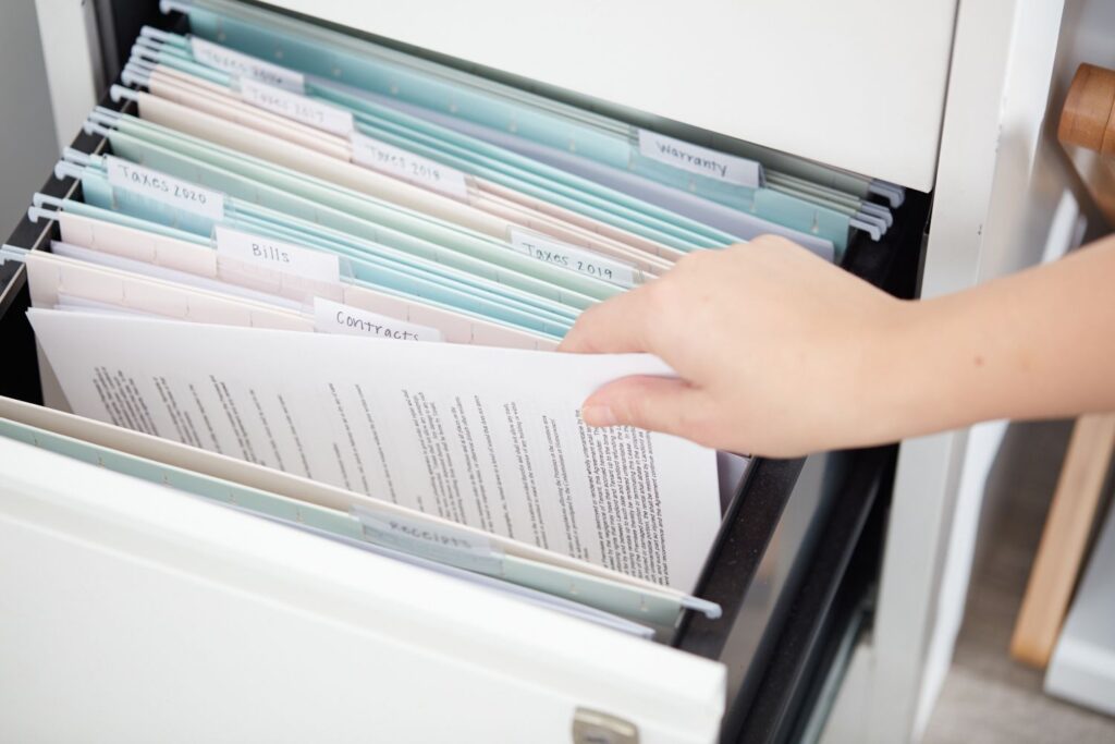Organizing A Home Filing System 2648257 01 Gatherpapers 3245 5e99eeb1854d4cb1a3ad9dbd824b2c04
