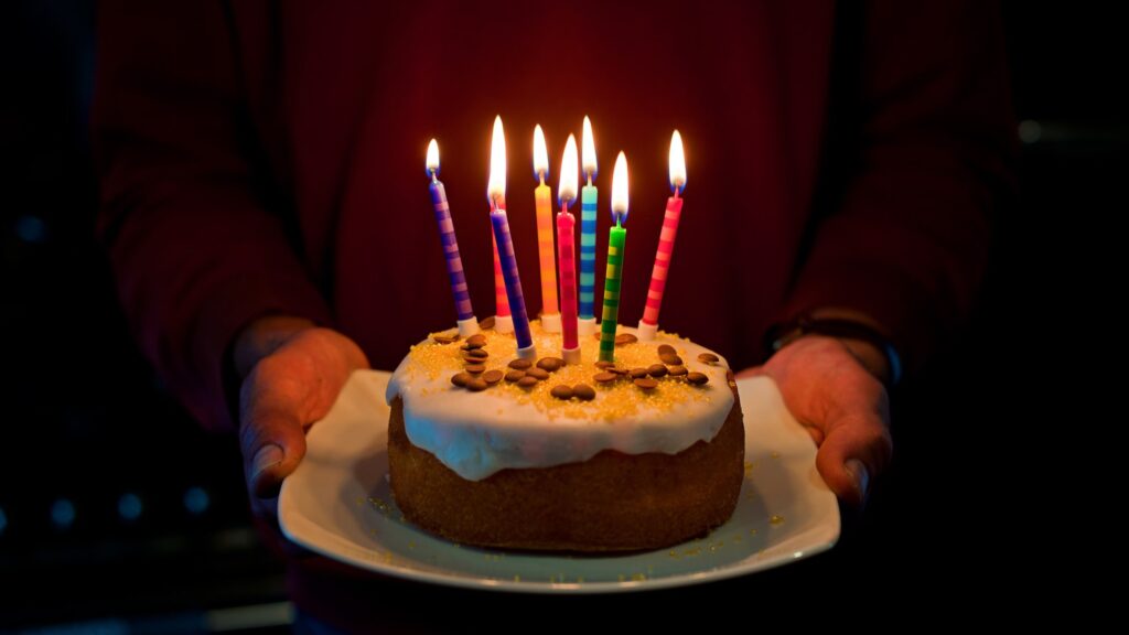 Putting Candles On Birthday Cakes