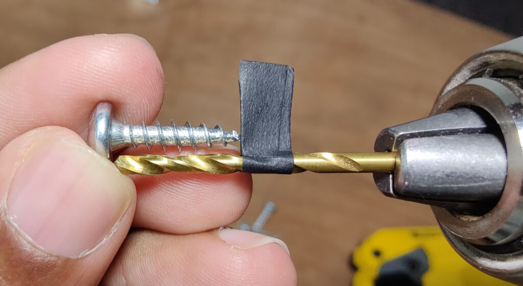 Putting Tape On A Drill Bit To Measure Depth