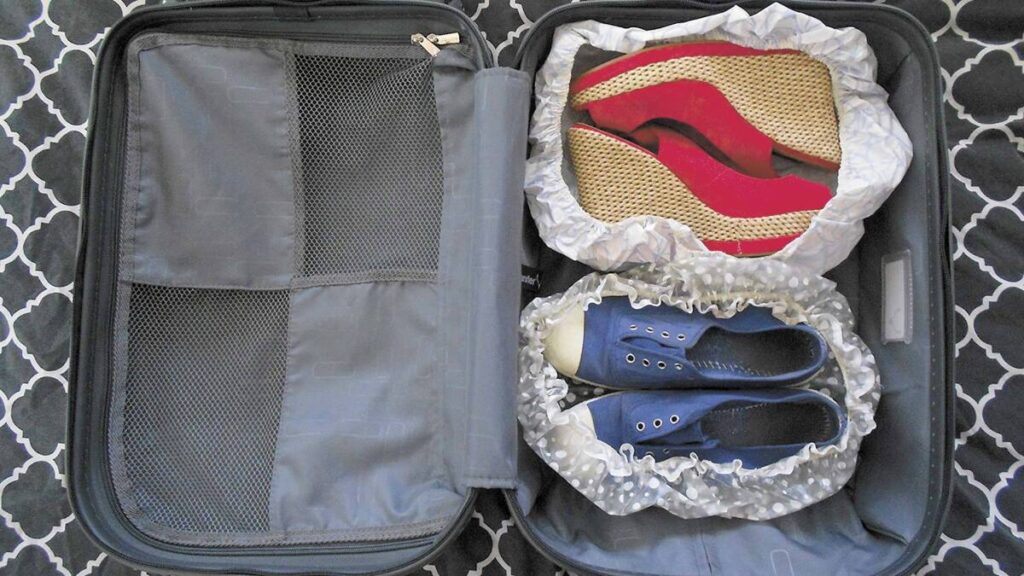 Using Shower Caps To Cover Shoes In Luggage
