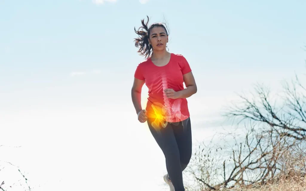 44704732 Pushing Through The Pain Shot Of An Attractive Young Woman Running Outdoors With Her Hip Injury Highlighted 1080x675