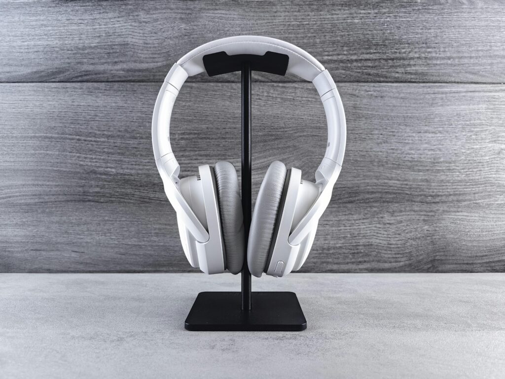 Elegant pair of limited edition headphones sitting on a sleek stand