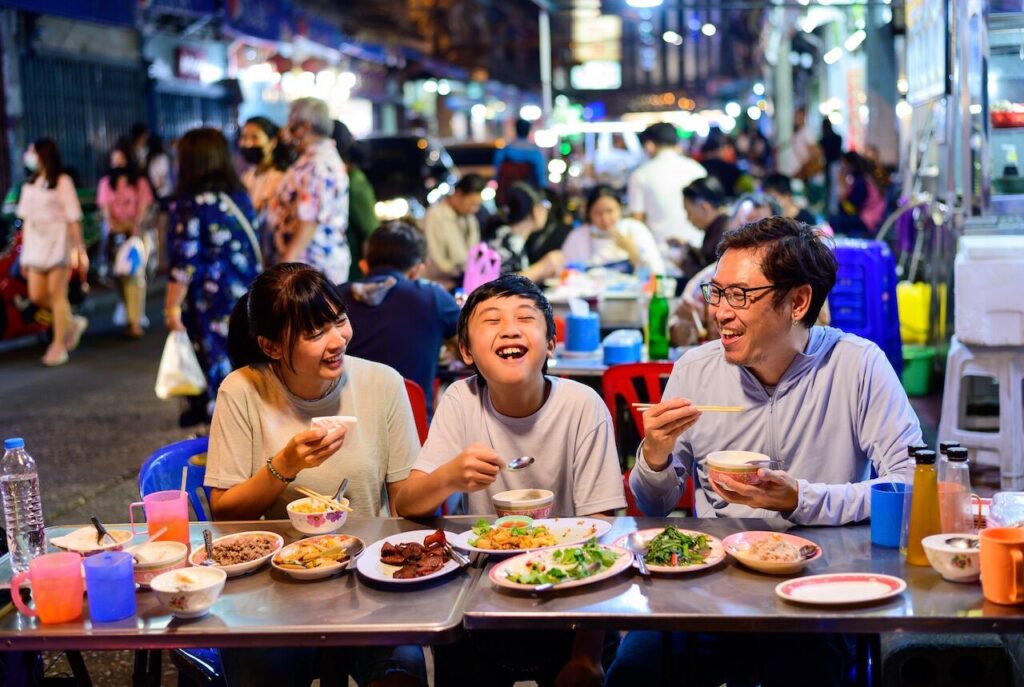 Family Having Dinner Street Food Yaowarat Road Bangkok Thailand