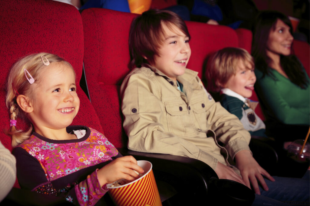 Family Night Kids At Movie Theater Istock 000026995660