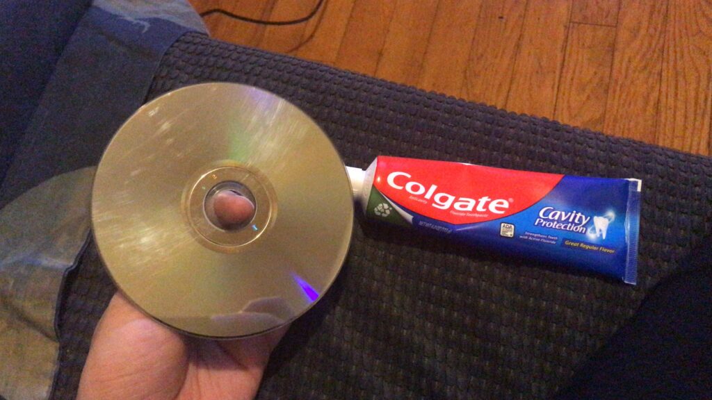 Fixing A Scratched Cd With Toothpaste
