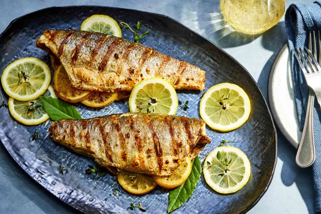 Lemon stuffed grilled branzino ft recipe0324 6d0a73fe0ad743309605df37066a9191