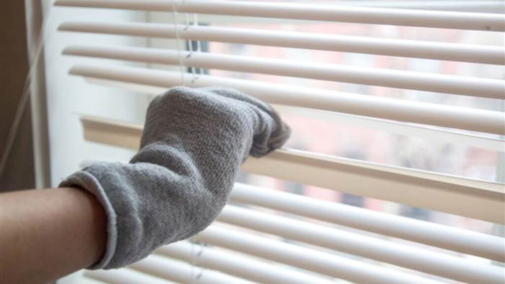 Old Sock As A Dusting Glove