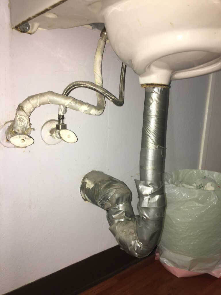 Sealing A Leaky Pipe With Duct Tape