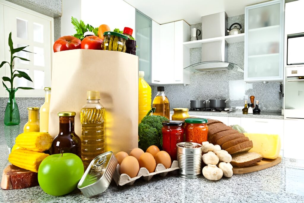 Well organized kitchen counter displays fresh groceries