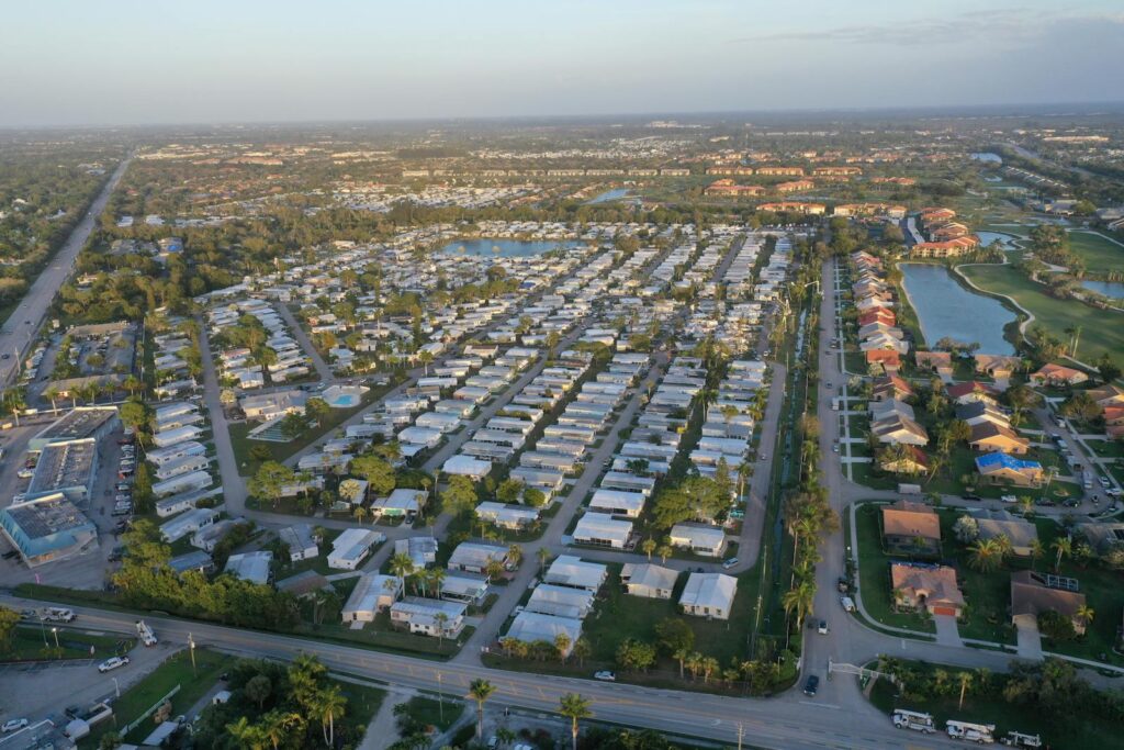 Aerial photo showcasing a suburban neighborhood in Fort Myers, Florida, with clear skies and organized streets.