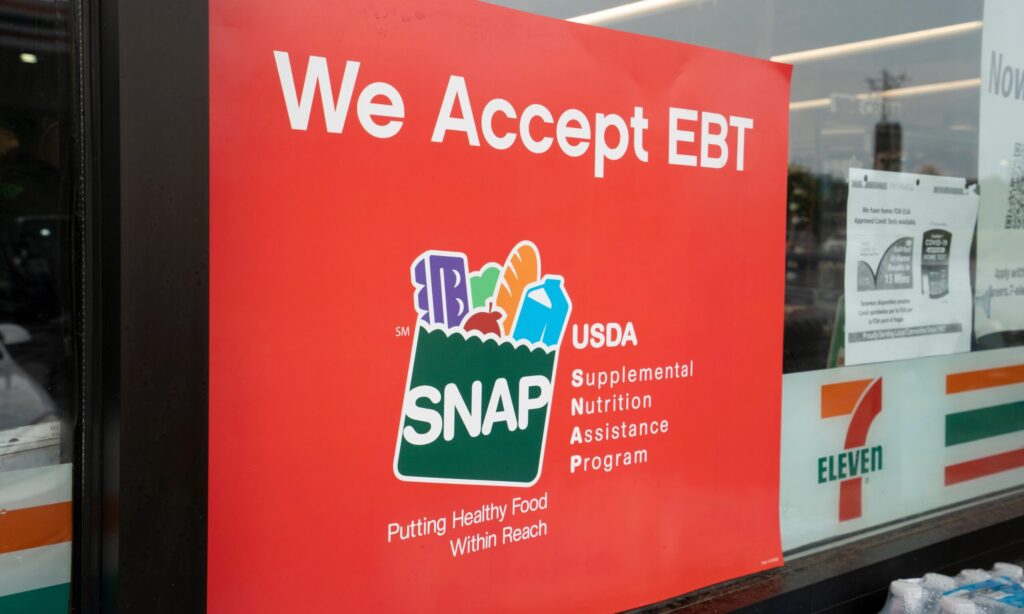 Spartanburg, sc, usa june 17, 2022: we accept ebt sign is seen outside a 7 eleven store in sartanburg, south carolina. the supplemental nutrition assistance program (snap) is a federal program.