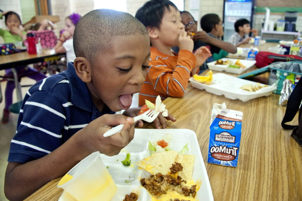 Boy already eaten his steamed broccoli as would enjoy the remain