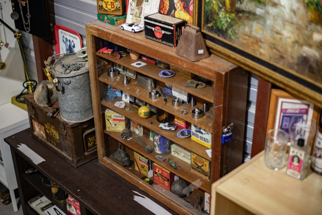 a wooden shelf filled with lots of different items