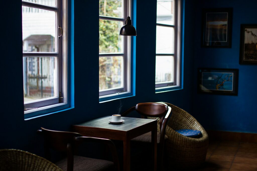 brown wooden table with chairs