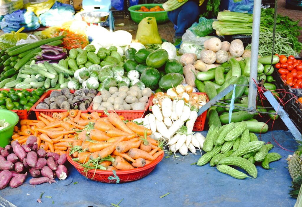 red and green chili peppers on red plastic plate