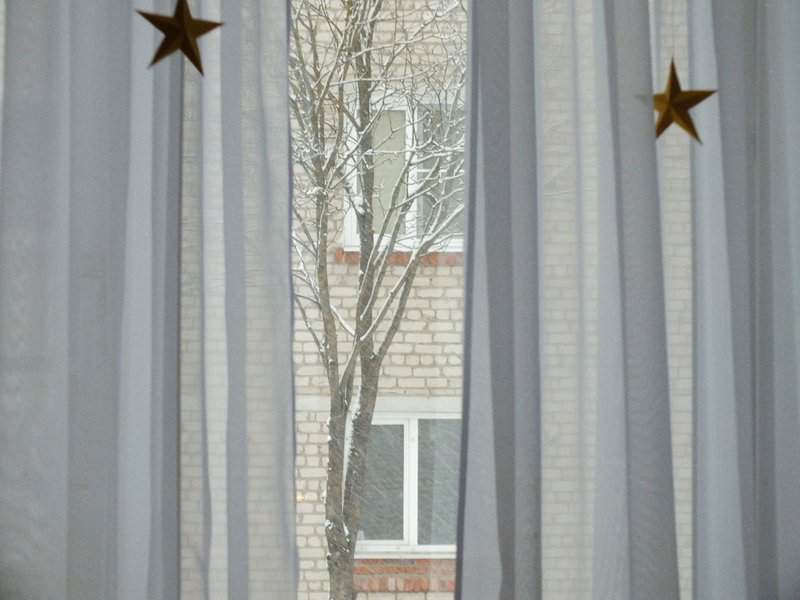 white and gray floral window curtain