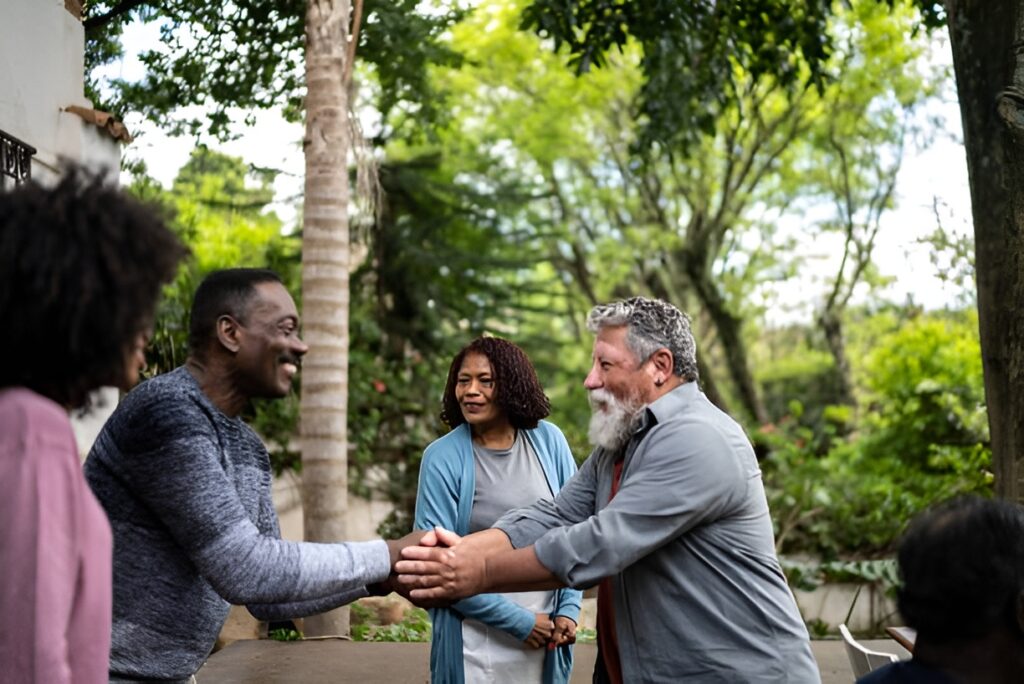 Neighbors happily gather outside charming tiny homes