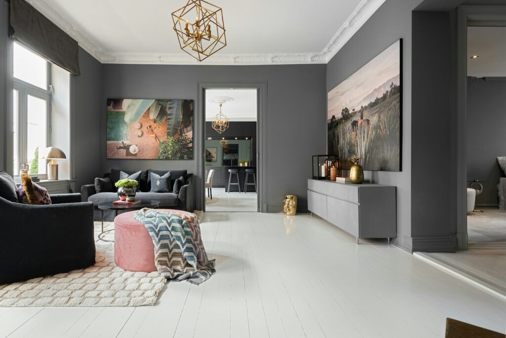 A living room filled with furniture and a chandelier