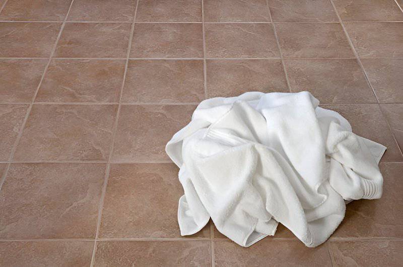 15. Leaving Wet Towels on the Floor