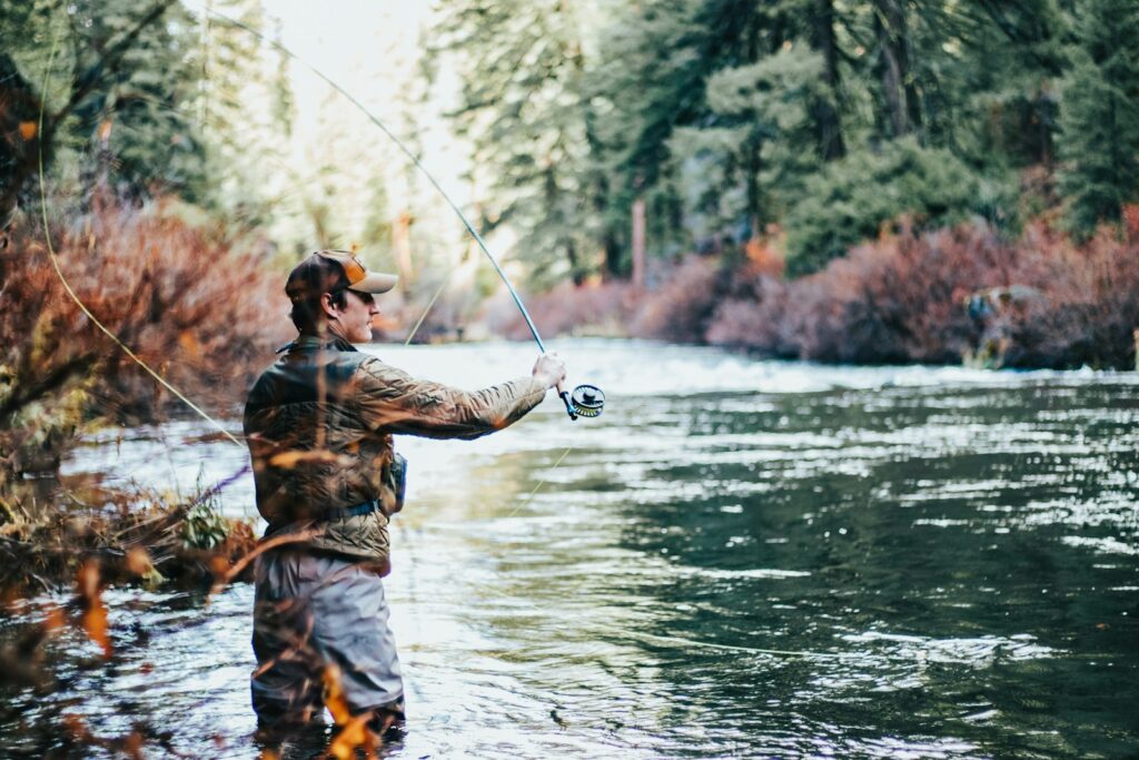 man fishing during daytime